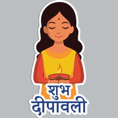 Sticker - Sticker Style Hindi Text of Happy Diwali and Indian Girl Character Holding Illuminated Oil Lamp (Diya) on Grey Background.