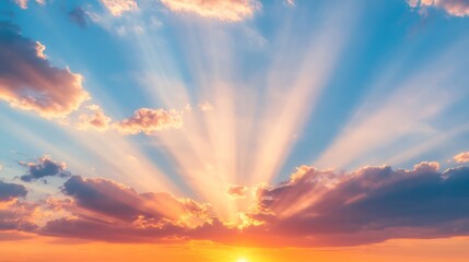 Poster - Sunlight bursting through scattered clouds at sunset, bathing the sky in a gradient of warm colors
