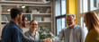© Surachetsh - Business professionals meet for the first time at a conference, exchanging smiles and handshakes as they introduce themselves. The environment is welcoming and conducive to networking.