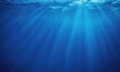 © Miklos - Sunlight streams through the ocean water, illuminating the deep blue depths