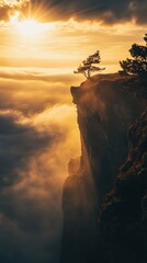 Poster - Lone tree standing on a cliff edge at sunset above the clouds