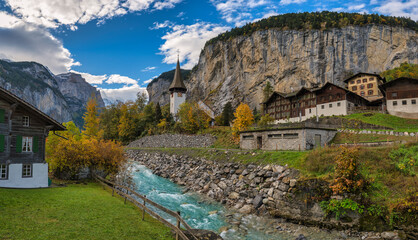 Sticker - Lauterbrunnen Switzerland panorama at village valley in autumn season