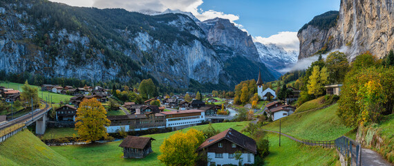 Sticker - Lauterbrunnen Switzerland panorama at village valley in autumn season