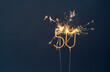 © Dmytro - 50 Years Celebration Festive Background made with Bengal Fires in the form of Number Fifty.