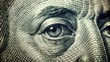 © Achiraya - A close-up shot of a dollar bill with an eye cleverly integrated into the design, blending currency and