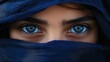 © ThisDesign - Closeup of the sapphire eyes of a girl with her face wrapped in a navy blue scarf generative ai