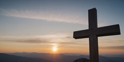 Christian cross at sunset