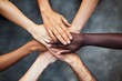 © juancarlos - Close-up of diverse hands with different skin tones in unity