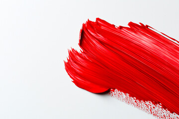 Wall Mural - bright red brush stroke of paint on white background