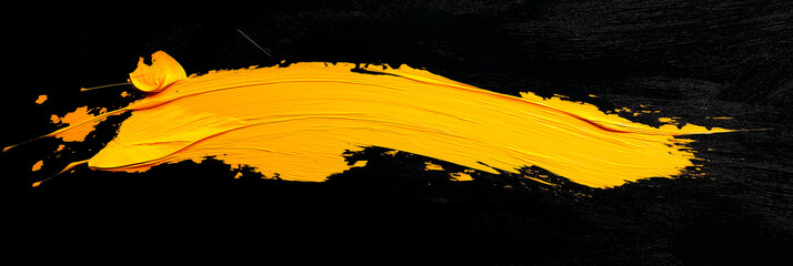 Wall Mural - bright yellow brush stroke of paint on black background