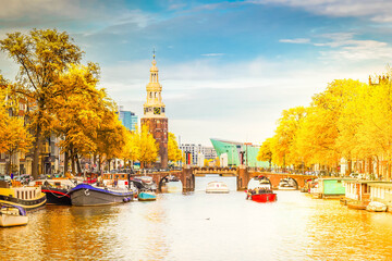 Sticker - Amsterdam old town center with the Montelbaans tower and Amstel river, Netherlands at fall