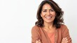 © Jelena - portrait of a radiant middleaged hispanic woman with a warm smile and crossed arms exuding confidence and joy set against a clean white background for a professional yet approachable look