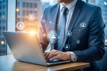 Businessman Using Laptop with Virtual Icons for Risk Management 