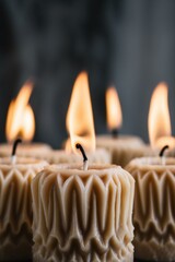 The photo showcases six cream-colored decorative candles burning brightly against a dark background, exuding a serene and peaceful atmosphere suited for relaxation and meditation.