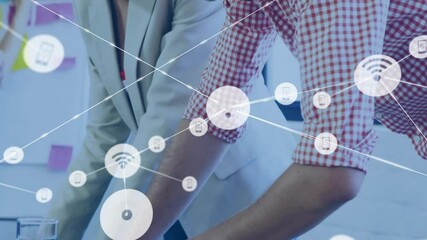 Poster - Animation of network of connections with icons over diverse colleagues discussing work in office