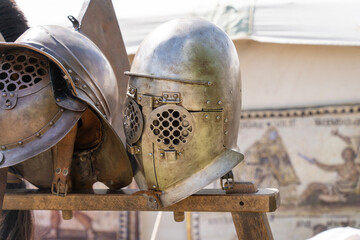 Ancient Roman gladiator helmets in a military camp