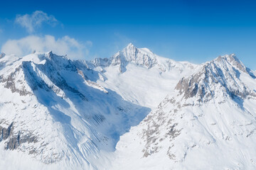 Wall Mural - switzerland. winter mountain landscape. wallpaper or background. cold weather and frost. high rocks 