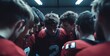 © Bonsales - Contemplative American football player getting ready for the game while teammates huddle around him