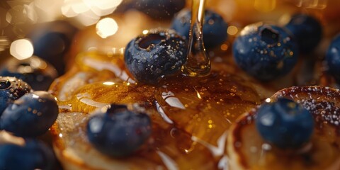 Poster - Close up view of morning breakfast Banana pancakes topped with fresh blueberries and drizzled with honey