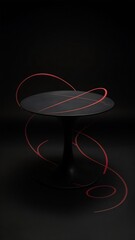 A black table with a black background with a red design on it.