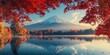 © Morng - Autumn scenery with vibrant red foliage framing a tranquil lake reflecting a majestic snow-capped mountain under a clear blue sky.
