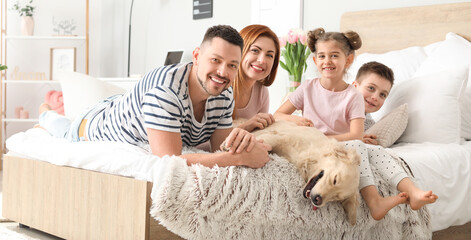 Canvas Print - Happy family with dog in bedroom at home