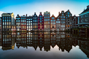 Amsterdam Netherlands dancing houses over river Amstel landmark in old european city