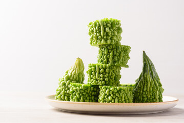 Fresh bitter gourd on white background, Food ingredient for cooking local thai food