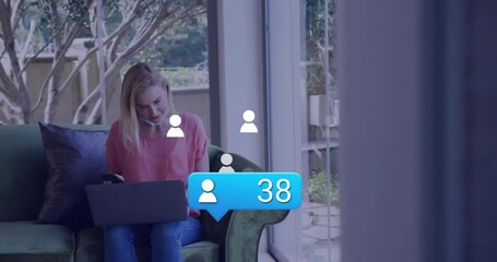 Poster - Animation of media icons over caucasian woman using laptop