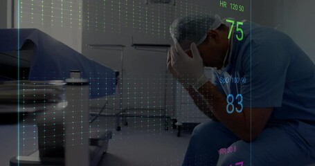 Poster - Animation of cardiograph over sad caucasian male doctor sitting