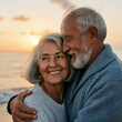 © Delly - An elderly couple shares an embrace on the beach.
