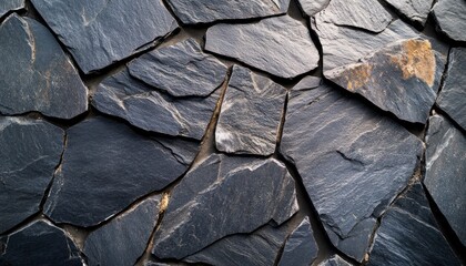 Canvas Print - Close-Up of a Rough, Irregularly-Shaped Black Stone Wall