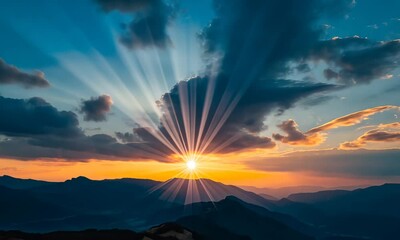 Wall Mural - Vivid sunrise over mountainous terrain with expansive clouds