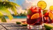 © BOJOShop - Refreshing Summer Cocktail with Lime and Orange on Tropical Beach