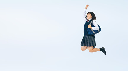 Aufkleber - 制服を着て元気にジャンプする女子学生の全身写真（切り抜き背景透過PNGも販売しております。作成者リンクから「PNG」で検索してください）