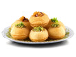 Pani Puri A vibrant assortment of pani puri with hollow puris filled with tamarind water