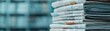 © Chanoknan - Stack of newspapers showcasing printed news in a modern setting, perfect for media or editorial use.