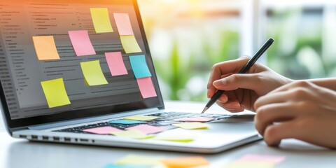 sticky notes on laptop screen for app flow, night setting