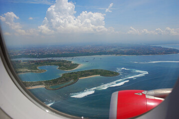 Aerial view from wimdow airplane sky summer tropical blue sky fluffy white cloud summertime on light sunny day cloudscape ocean seascape. Clear bright blue skyline spring sunlight climate background