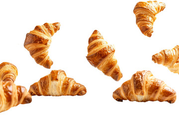 Croissants falling in the air isolated on white or transparent background