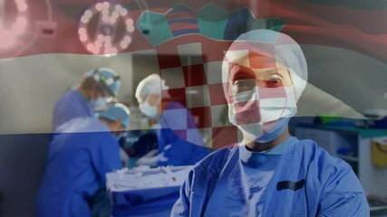 Poster - Animation of flag of croatia over diverse surgeons in hospital