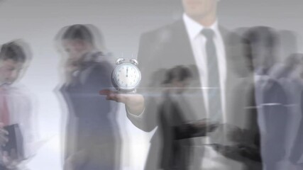 Sticker - Animation of ticking alarm clock over businesspeople in fast motion