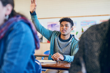 Poster - Man, student and hand raised for education, classroom or notes with solution for test at university. Person, thinking and books for learning, question and answer for quiz with diversity at college