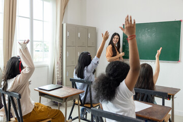 A group of children are in a classroom with a teacher