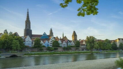 Wall Mural - City of Ulm in Germany during a sunset, Old Town with Cathedral. Timelapse video