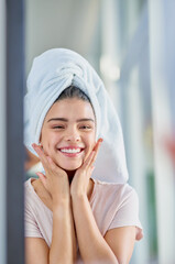 Wall Mural - Mirror, excited or woman in bathroom with beauty, glow or smile for wellness in house or home. Face, towel and happy girl with confidence, cosmetics results or skincare with dimples, health or pride