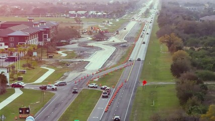 Wall Mural - Industrial roadworks. Wide American highway under construction. Development of transportation system for rapid transit.