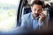 © Dragana Gordic - Businessman Making a Phone Call During Train Ride