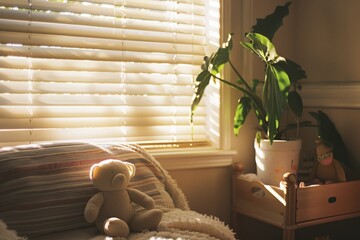 Sunlight filters through blinds in a cozy room, casting a warm glow over a plush teddy bear and a leafy plant.