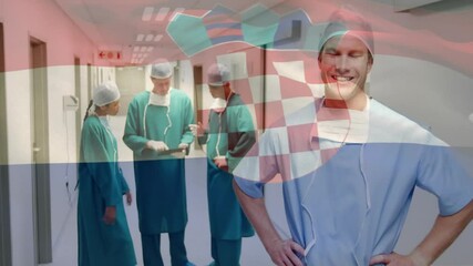 Poster - Animation of flag of croatia over caucasian surgeons talking and smiling